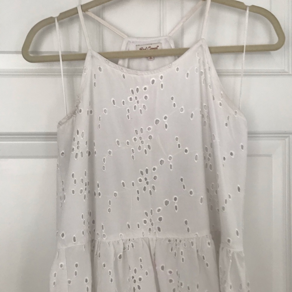White flowing tank